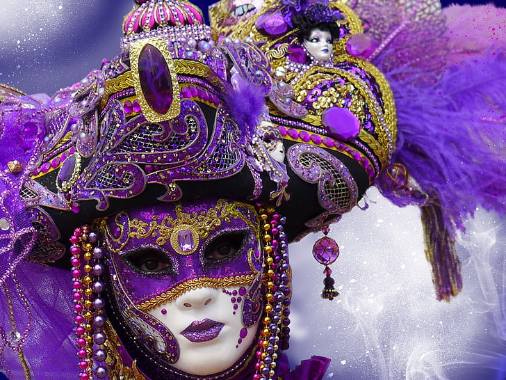 purple and gold-colored mask