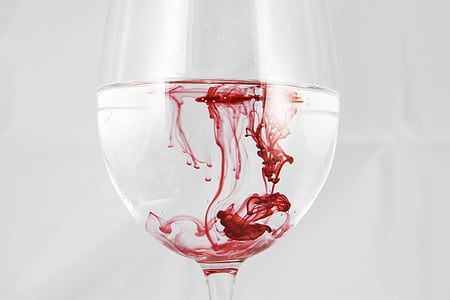 wine glass filled with liquids