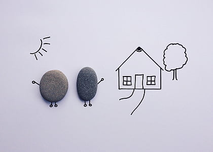 two black stones near house drawing
