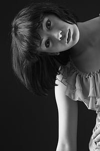 grayscale photography of woman in short-sleeved dress