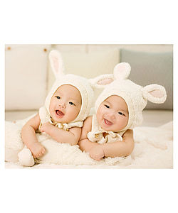 two toddler's with bunny outfits