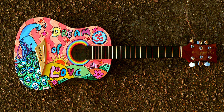 multicolored acoustic guitar