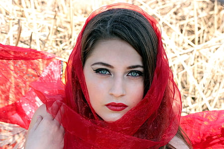 woman wearing red hijab headdress