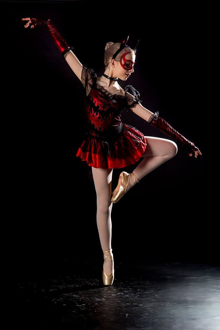 woman wearing red and black ballerina dress