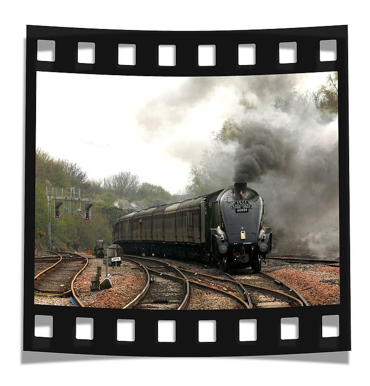 photo of black train against white background