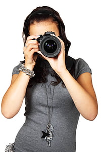 woman holding DSLR taking photo