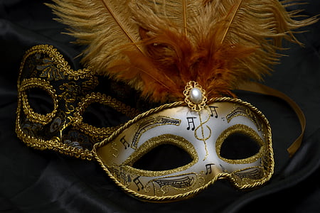 beige and white masquerade mask