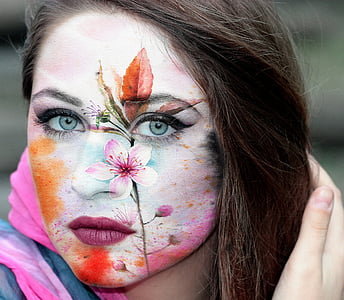 pink flower printed on woman's face