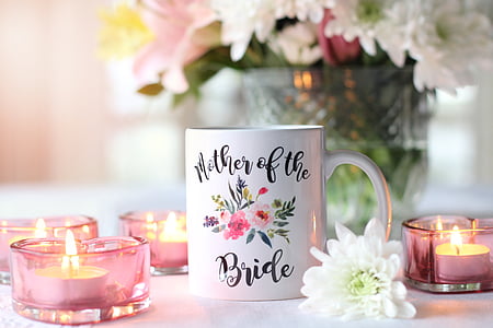 white and black floral ceramic coffee mug