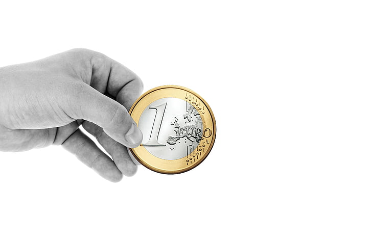 round silver-and-gold-colored 1 Euro coin