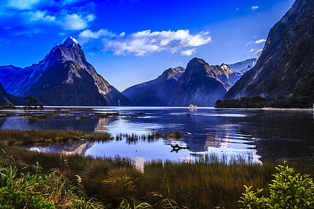 landmark photo of lake between mountains during daytime