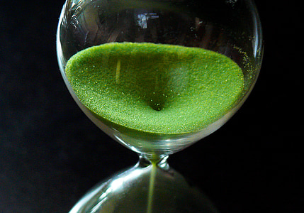hourglass with green sands