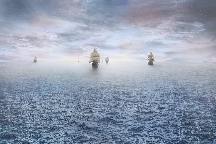 six galleon ships on body of sea during daytime