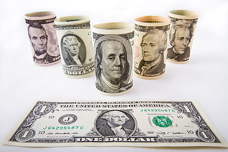 five assorted U.S dollar banknotes