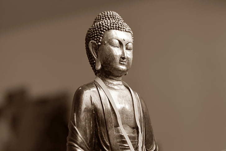 gray buddha figurine