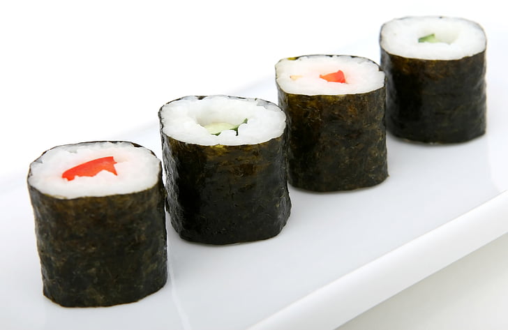sushi on white ceramic platter
