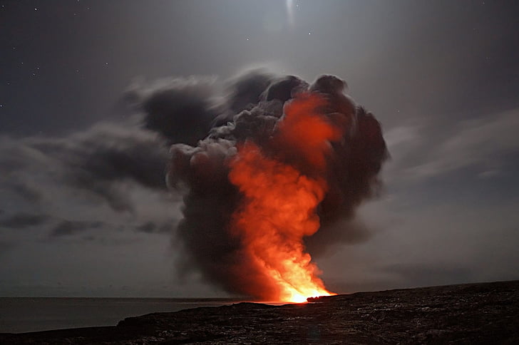 photo of volcano with smoke