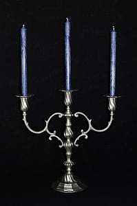 gray 3-slot candelabra with candles