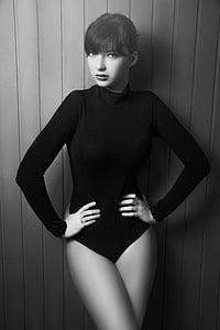 woman wearing black letard in grayscale photography