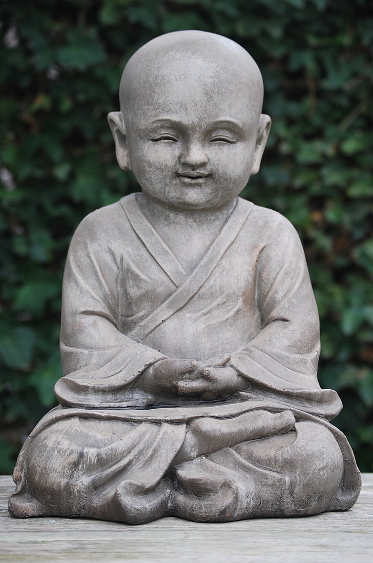monk in lotus position statuette