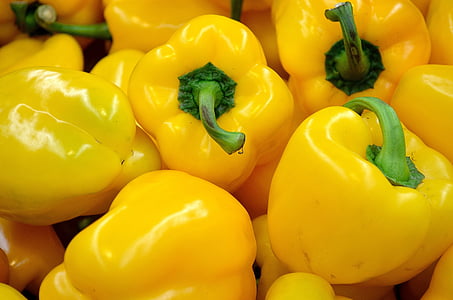 bunch of yellow bell peppers