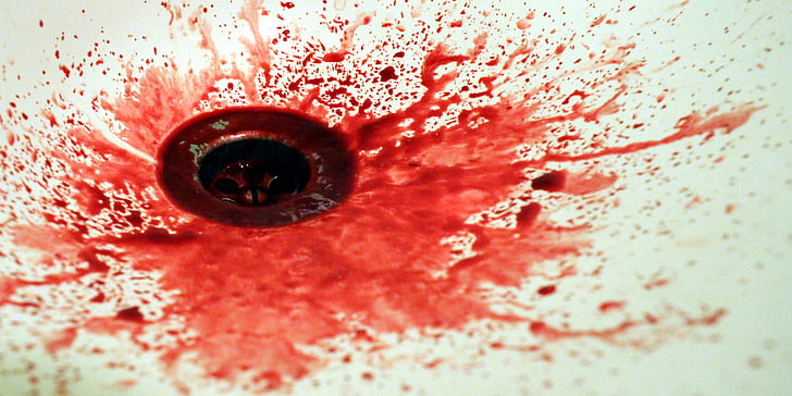 blood on white ceramic sink