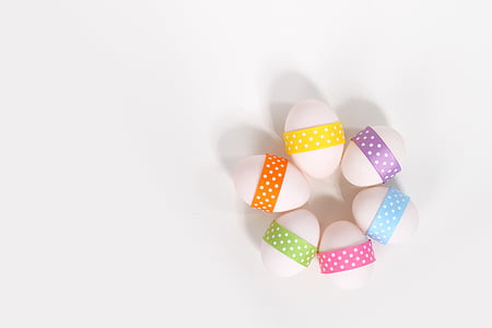 six assorted-color egg decors