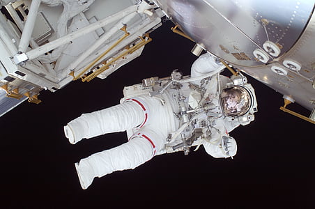 astronaut floating on space