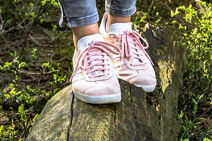 Royalty-Free photo: Person wearing pair of pink low-top sneakers | PickPik