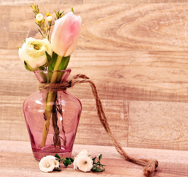 pink glass vase with pink tulips and white rose