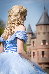woman in blue tulle gown