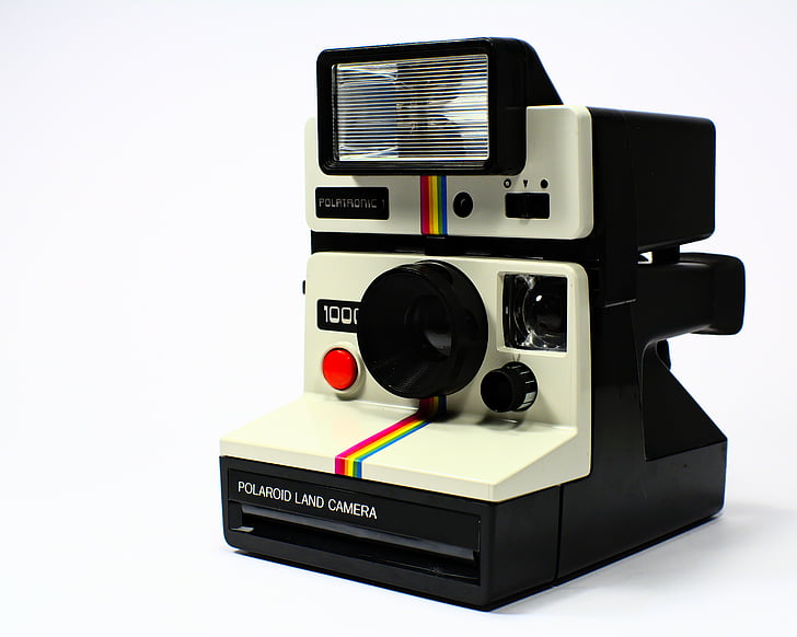 white and black Polaroid 1000 land camera
