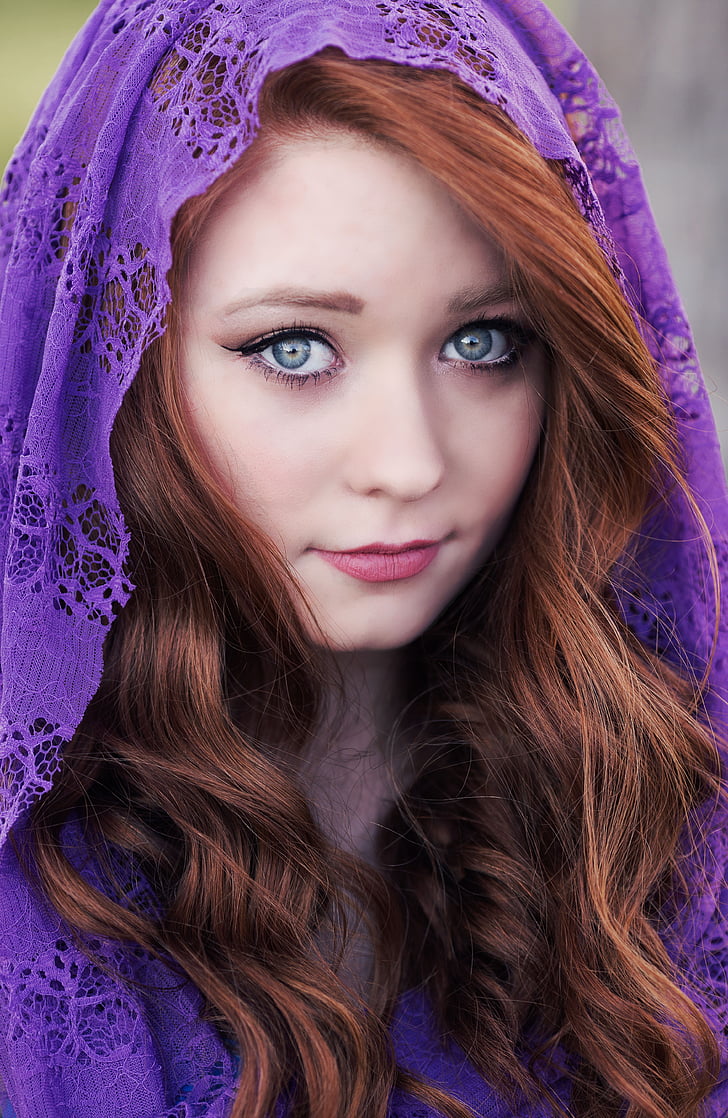 woman in purple headdress