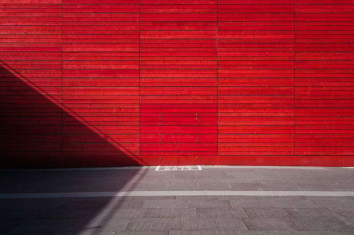 red concrete wall during daytime