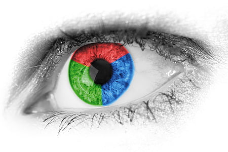 person's blue, red, and green iris