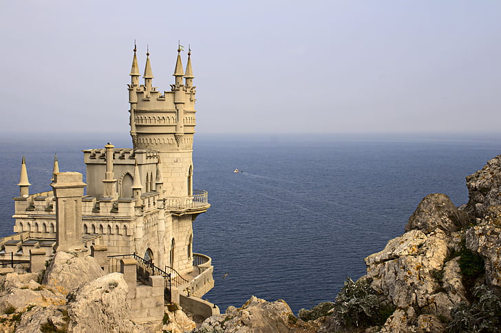 beige castle across the sea