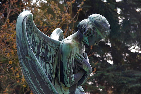 teal and gray angel statue