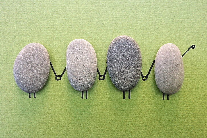 closeup photo of four gray stones