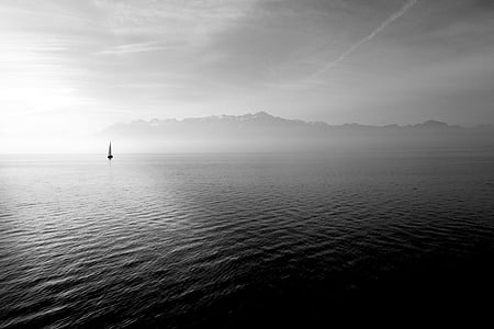 boat sailing on the body of water