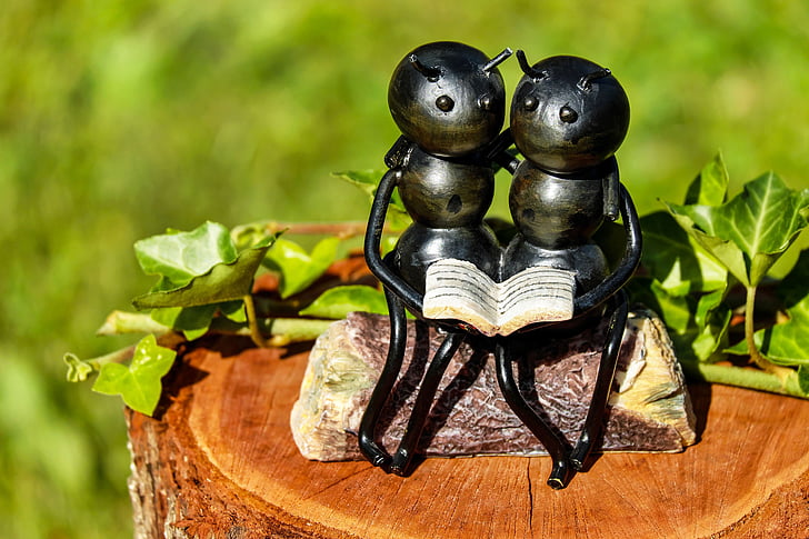 selective focus photography of ants figurine