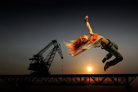 woman on air with crane background