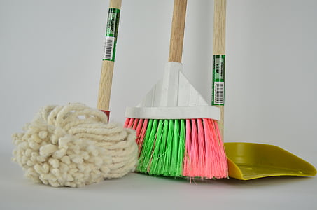 white floor map, broom and dustpan
