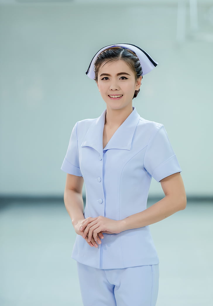 woman wearing nurse uniform