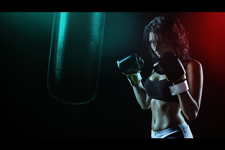 Woman Wearing Black Sports Bra and Short on Boxing Ring · Free Stock Photo