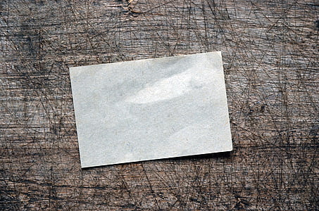 white card on rug