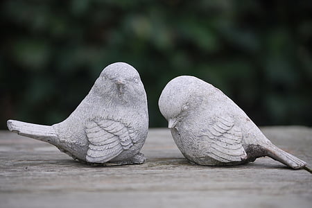 two bird ceramic figurines