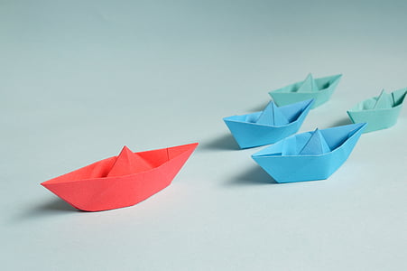 red and blue origami boats