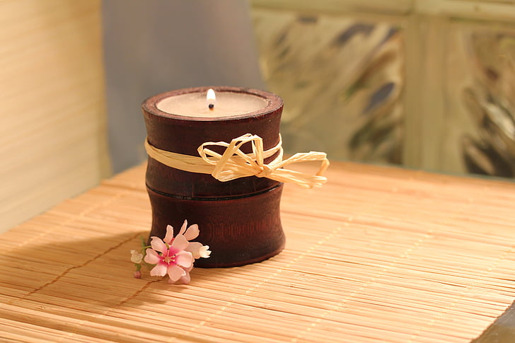brown wooden candle holder