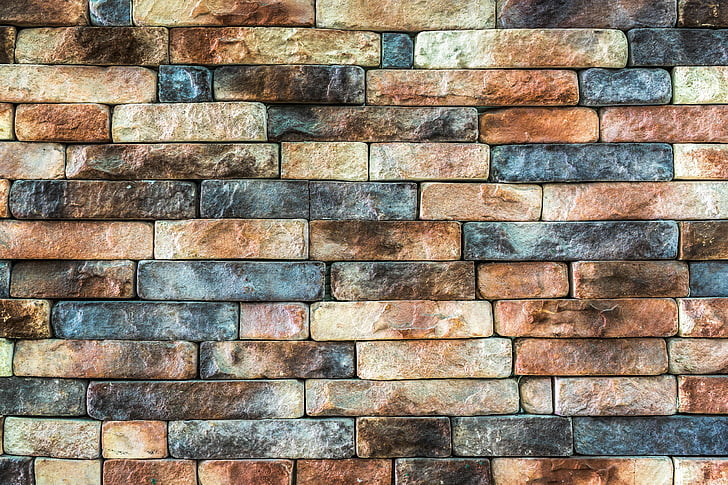 closeup photo of brown and black brick