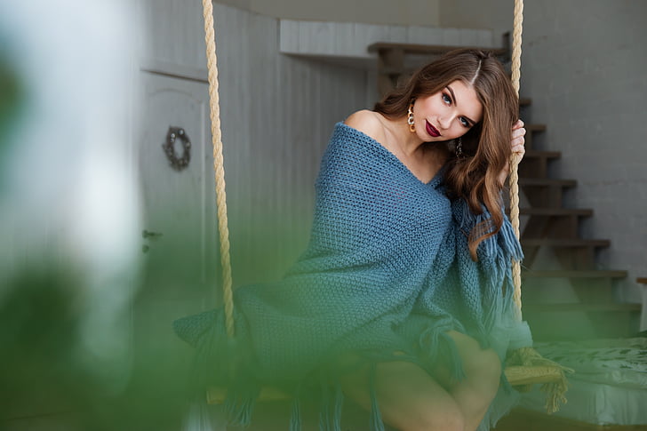 woman wearing blue towel sit on swing selected photography